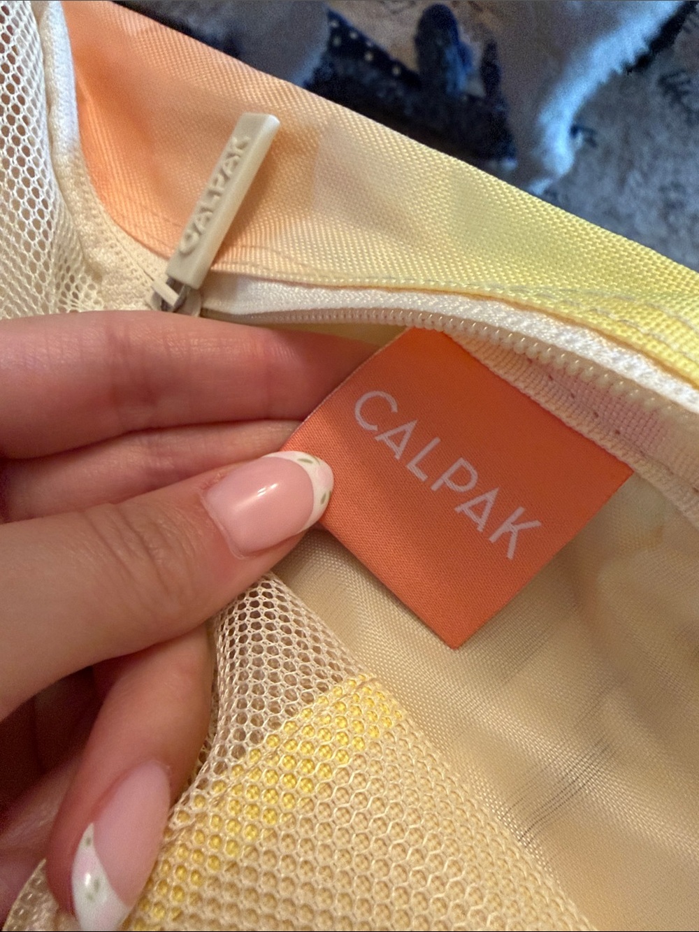 Calpak Yellow Mesh Packing Cube with Top Handle - Picture 2 of 3